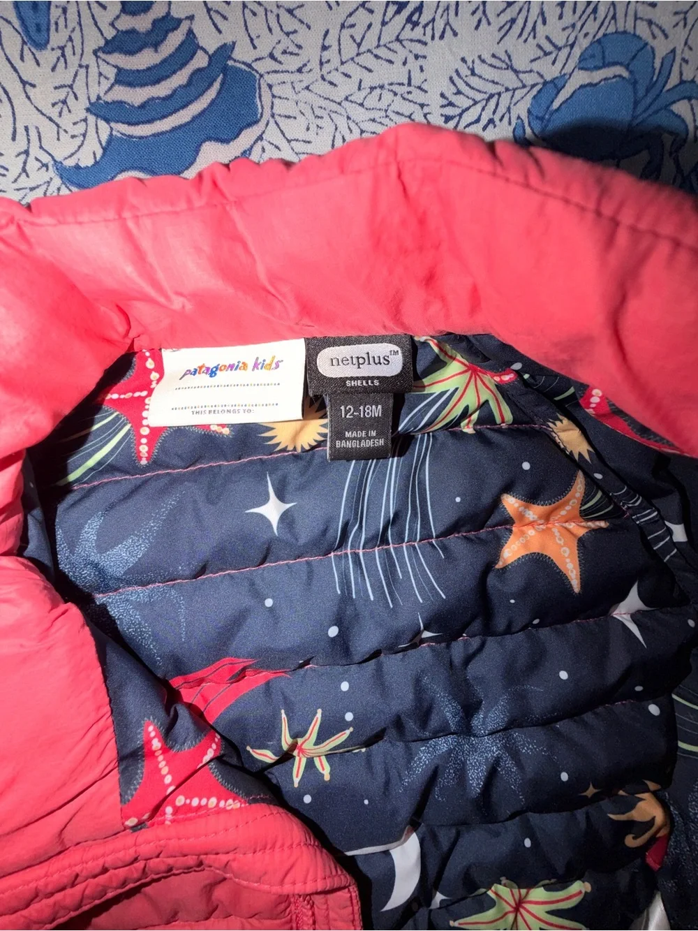 Patagonia Kids Coral Pink Puffer Jacket with Navy Starfish Lining